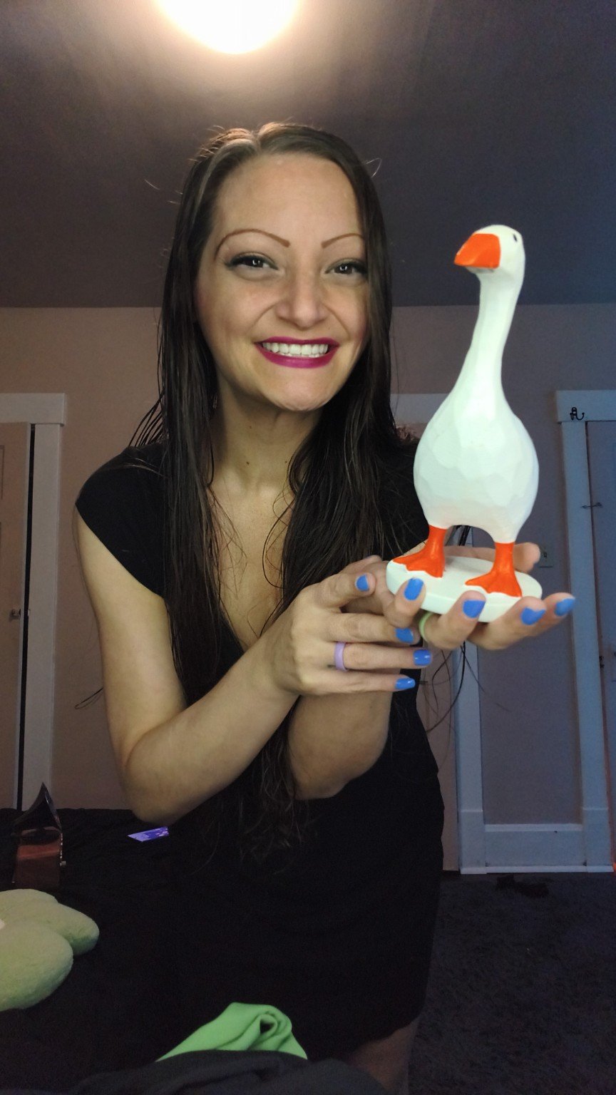 Ren holding a GRAPMKTG magnetic goose key holder